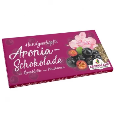 Handgeschöpfte Aronia Schokolade mit Rosenblüten und Heublumen 100g